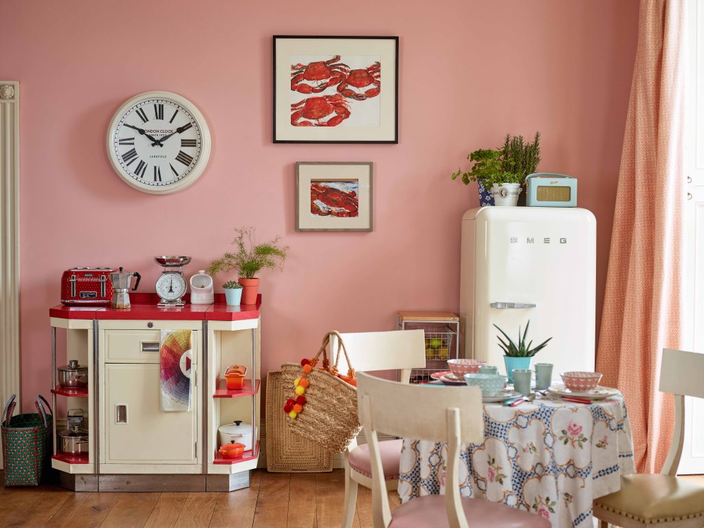 Natural paint manufacturing. Rose coloured kitchen. Lobster decor. Smeg fridge